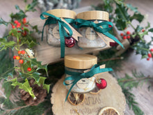 Natural handmade bath salts in jar with bamboo lid.