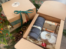 Christmas gift box with natural handmade soap and soap ladder, a duo of aromatherapy shower steamers and  luxurious bamboo flannel.