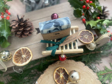 Christmas handcrafted natural soap bar and ladder, wrapped in ribbon with a Christmas tag and bauble.