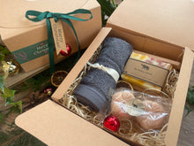 Christmas gift box with natural handmade soap and soap ladder, a duo of aromatherapy shower steamers and  luxurious bamboo flannel.