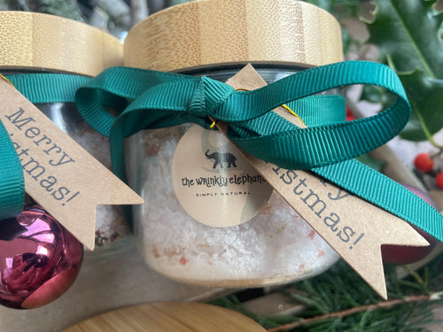 Natural handmade bath salts in jar with bamboo lid.