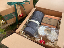 Christmas gift box with natural handmade soap and soap ladder, a duo of aromatherapy shower steamers and  luxurious bamboo flannel.