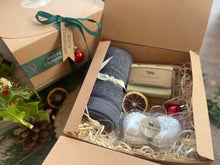 Christmas gift box with natural handmade soap and soap ladder, a duo of aromatherapy shower steamers and  luxurious bamboo flannel.