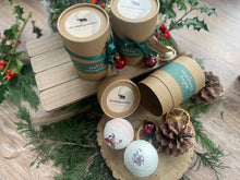 2 natural bath bombs in a kraft tube with Christmas ribbon ,tag and bauble.