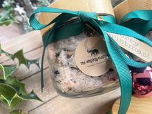 Natural handmade bath salts in jar with bamboo lid.